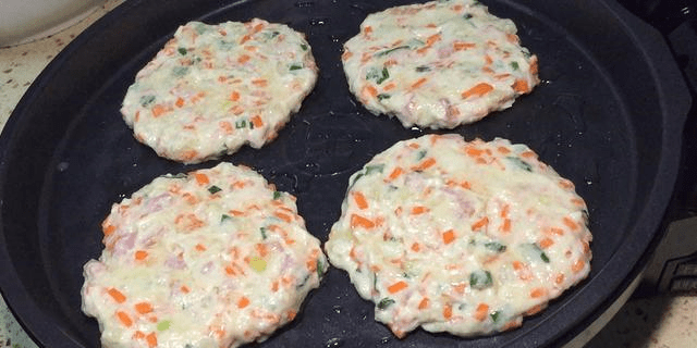 土豆饼做法简单又好吃又脆 84b5d5f5dc86409bafd28443a22032a4.png