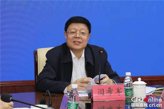 闫希军到海南省司法厅调研