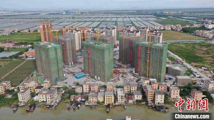广州南沙万顷沙安置区一期项目封顶 助力自贸区建设