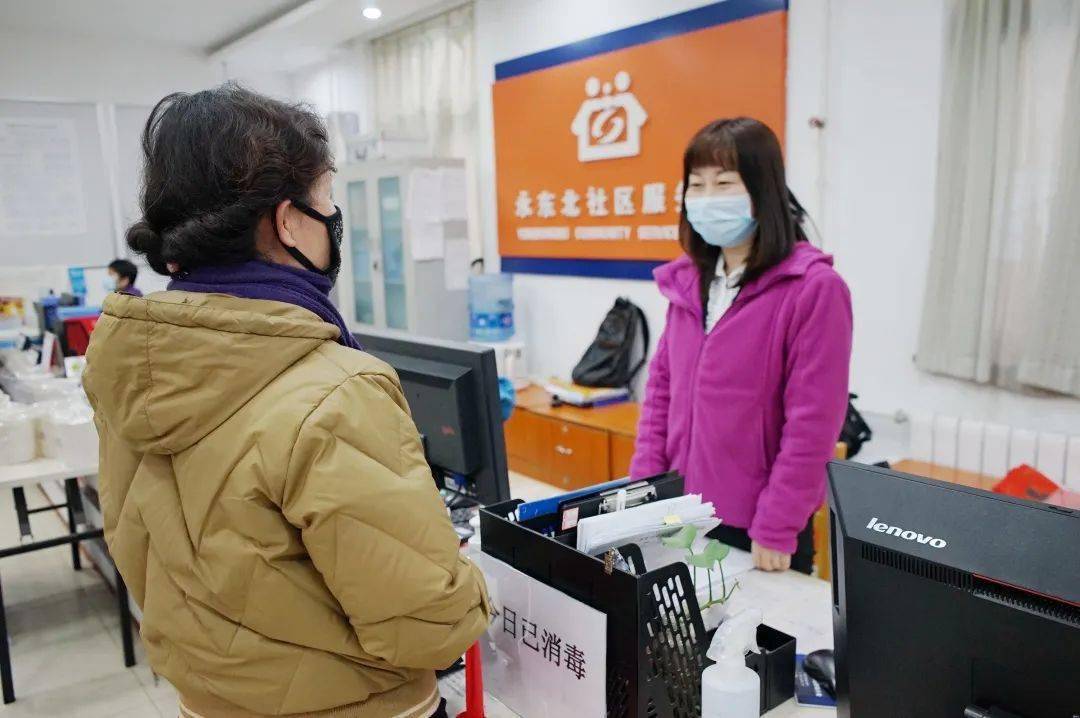 在京过大年社区工作者杨莉社区居民就是我的亲人在哪里过年都一样