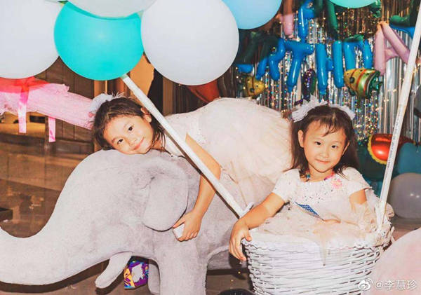 a4腰人鱼线堪比少女,曾因病无法生育,如今双胞胎女儿超可爱_李慧珍