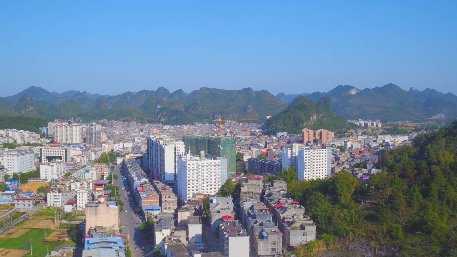 夯实脱贫致富基石忻城县统筹推进基础设施建设工作侧记