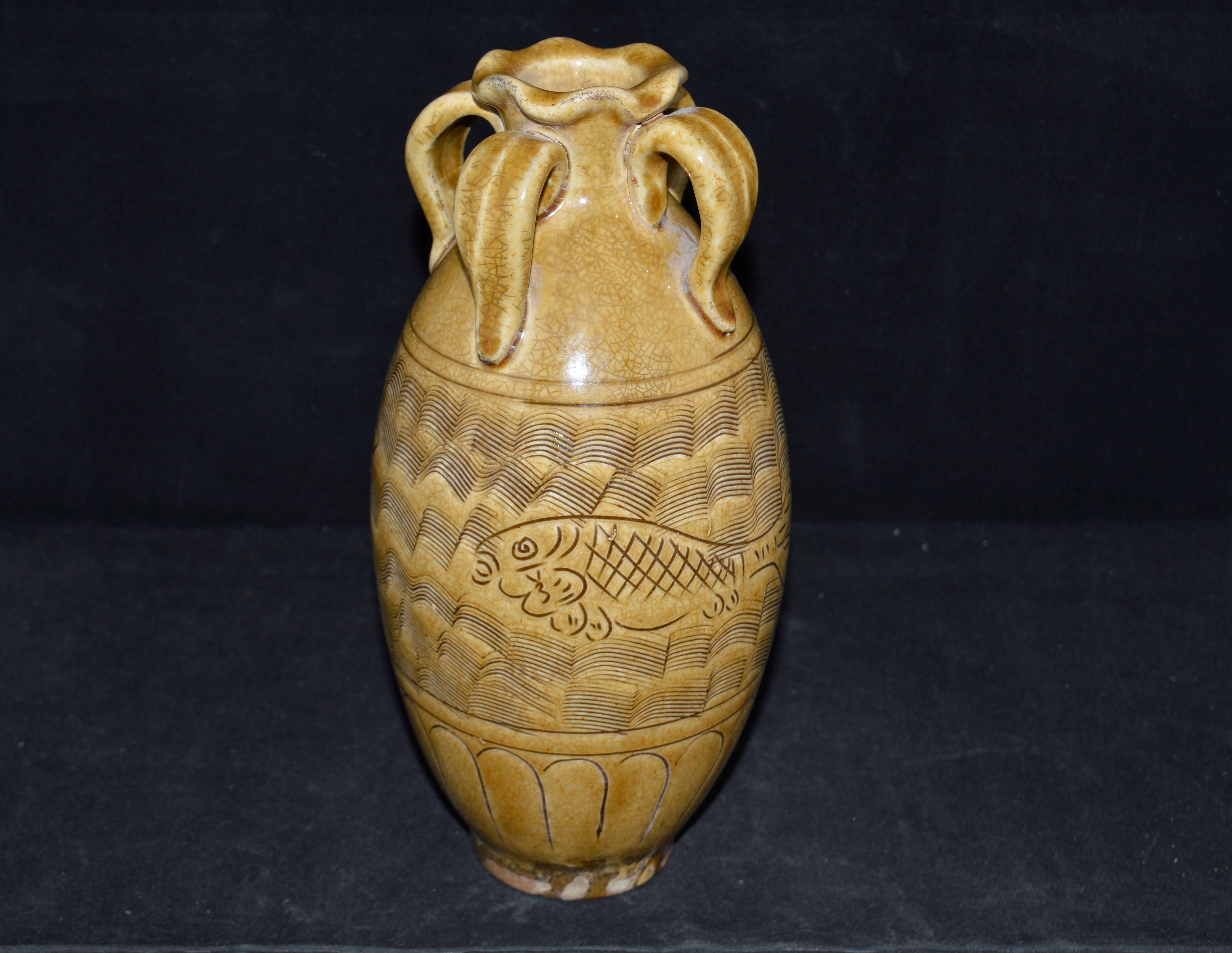 酱黄釉刻双鱼纹花口四系瓶