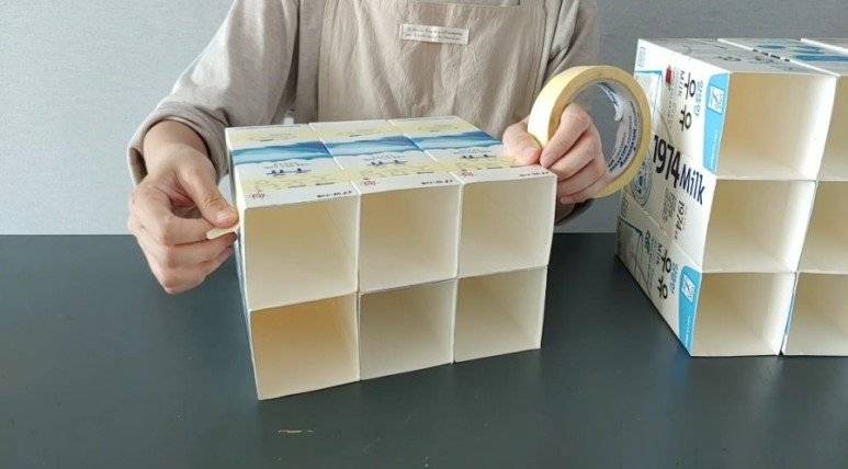 喝完牛奶的盒子别急着丢学她做个巧妙改造整理出丰富收纳空间