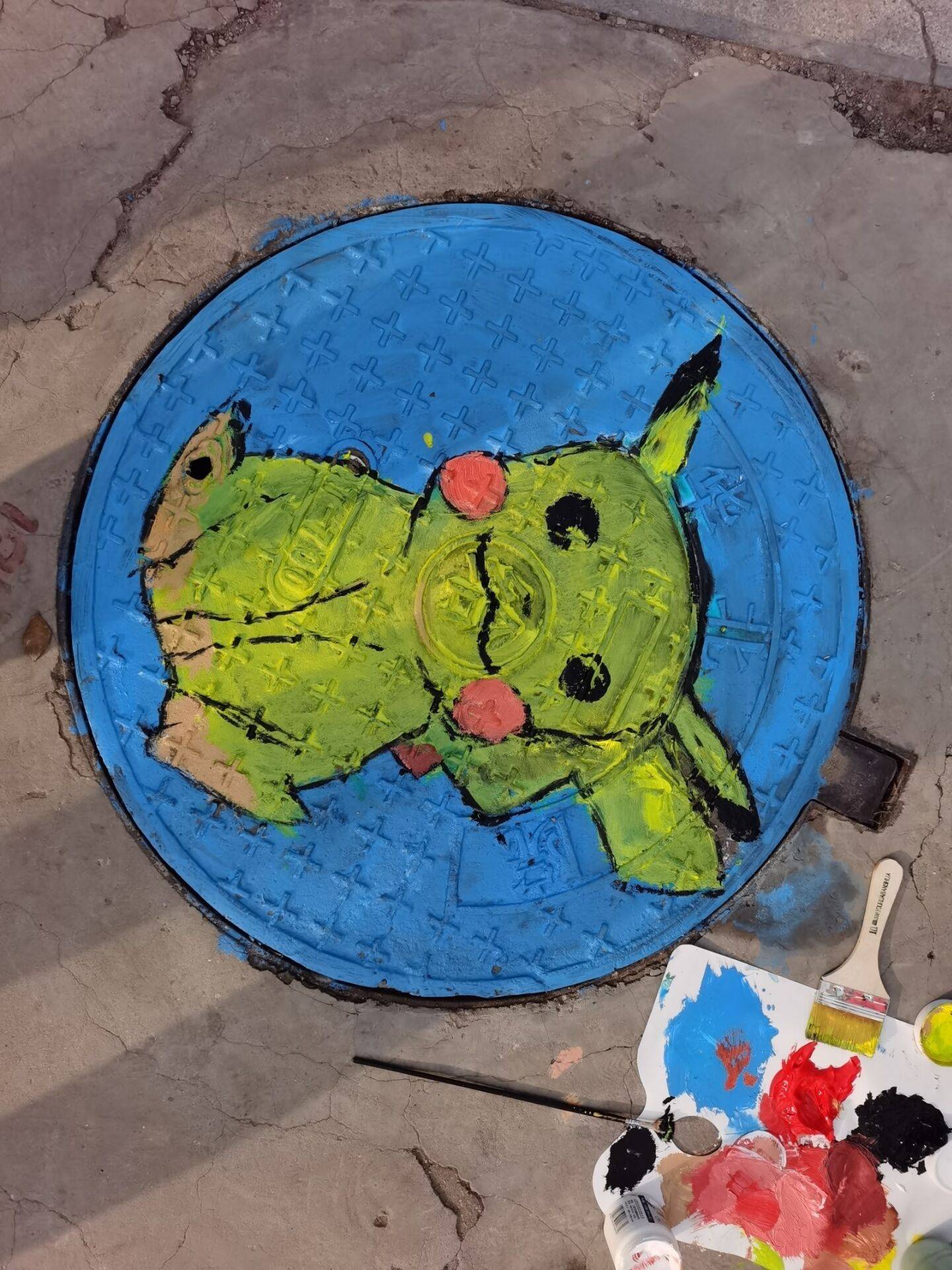 "井盖涂鸦"志愿服务活动