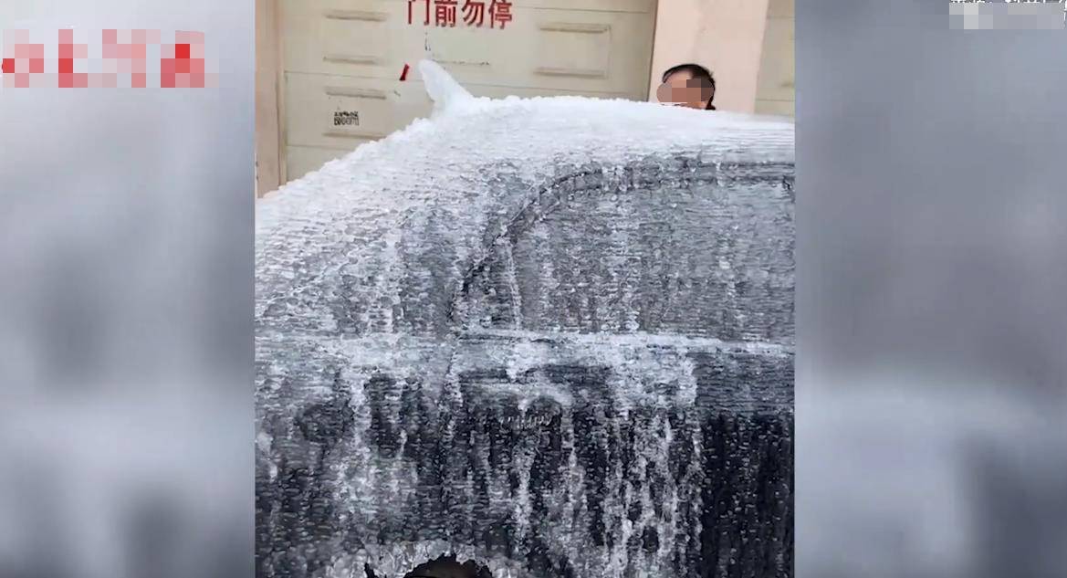 堵车库门不留电话被泼水成冰车（图）