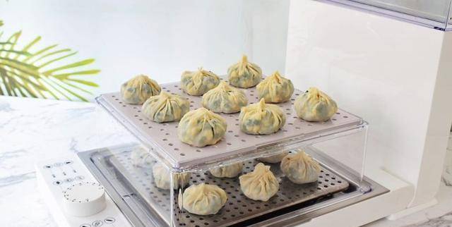 怎样做包子不粘蒸笼布 d6f13c07bfef4c4188525fda129014ac.jpeg