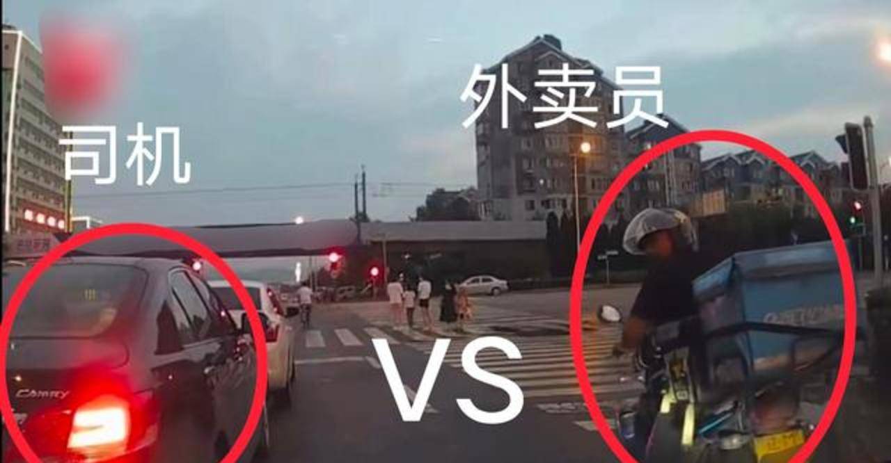 大连一司机和外卖员路口起冲突 上演追车大战 小车