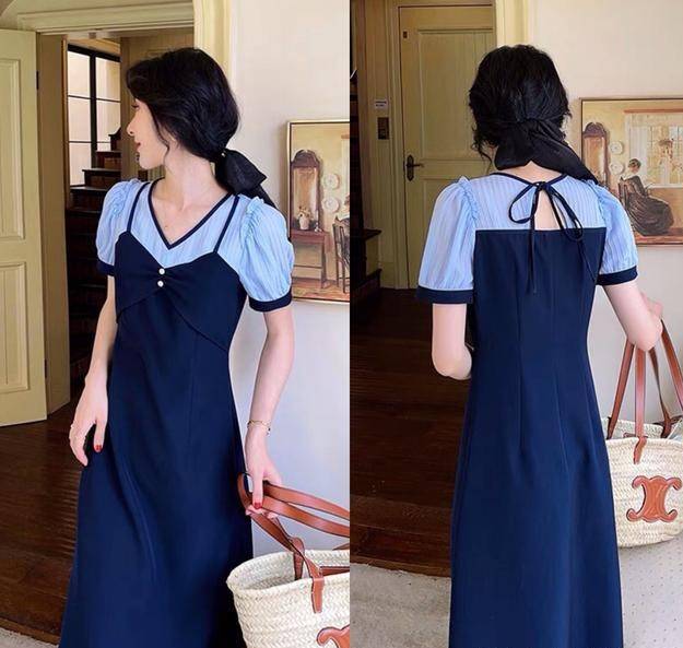 服装|在穿搭服装时，我们也可以去尝试一款拼接款式的裙子
