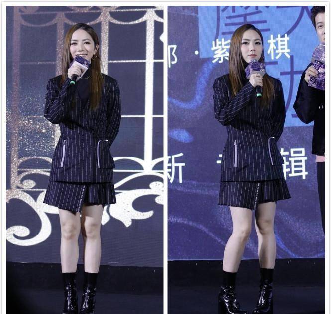 显得 邓紫棋太会修饰身形，穿上条纹的服装，小个子也能变大长腿