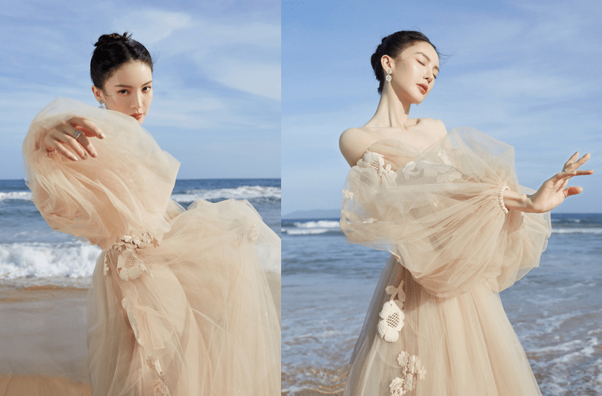 身材 被金晨的“国风”造型惊艳了，穿黑碎花吊带裙身材有料，曲线撩人