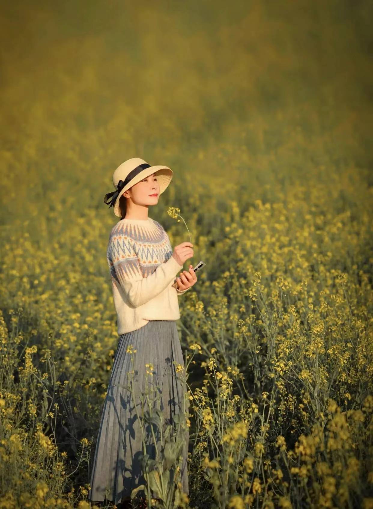 中年女性拍花海人像有技巧