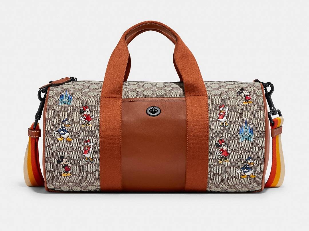 coach与迪士尼合作系列包包带你领回家