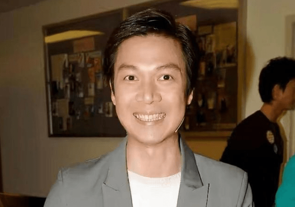 香港“贱男”梁荣忠罕现身，因车震门被港姐前女友分手，称仍单身