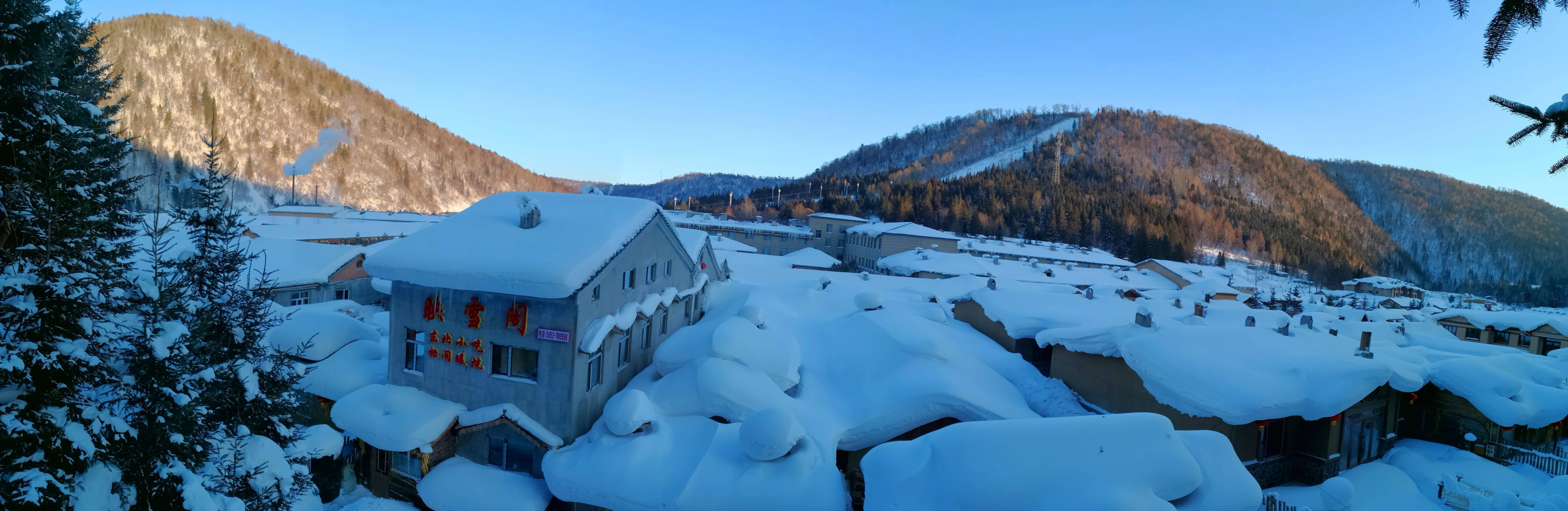 雪景似梦境 木屋展温情