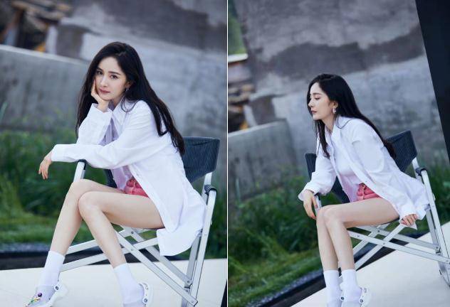 美腿斜跨椅子上显霸气,穿深v背心好妩媚_黄子韬_照片_时尚