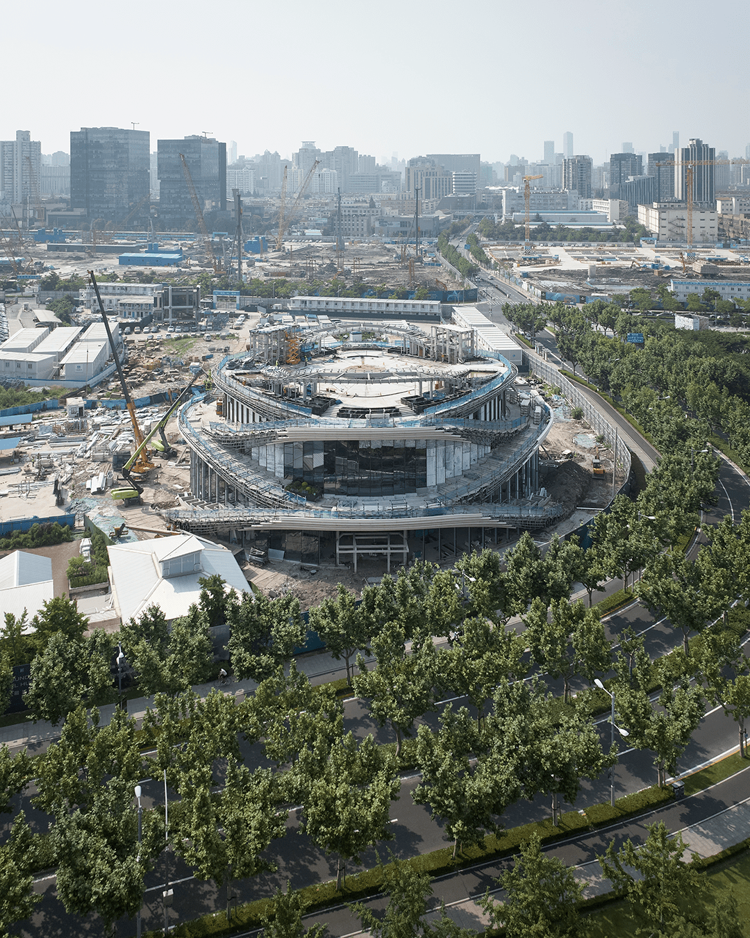 英国建筑师设计的上海新地标!黄浦江畔"西岸漩心"炫目亮相