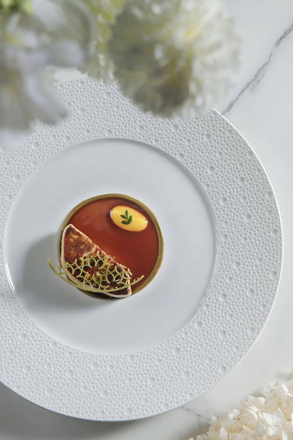 s, and crispy guanciale combines the freshness of shellfish with