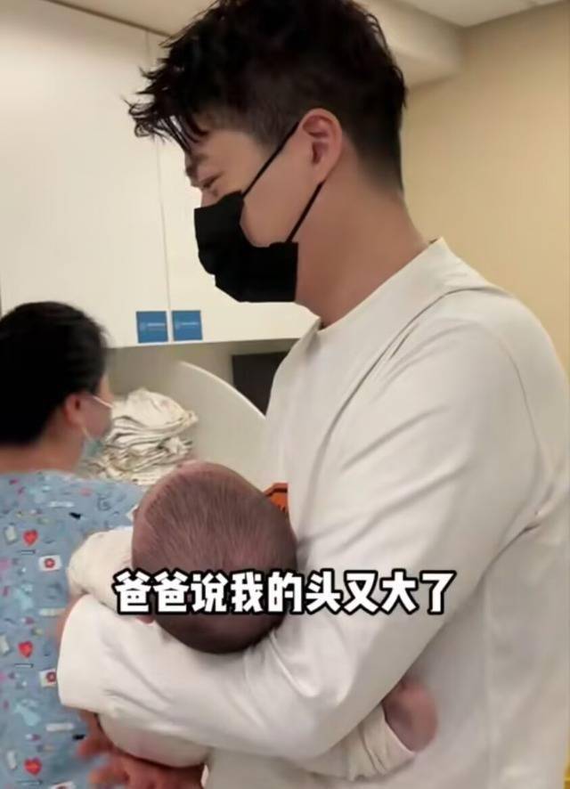 沈涛夫妇带娃打疫苗,半岁"小板栗"头大随爸爸,高颜值太太贤惠_儿子