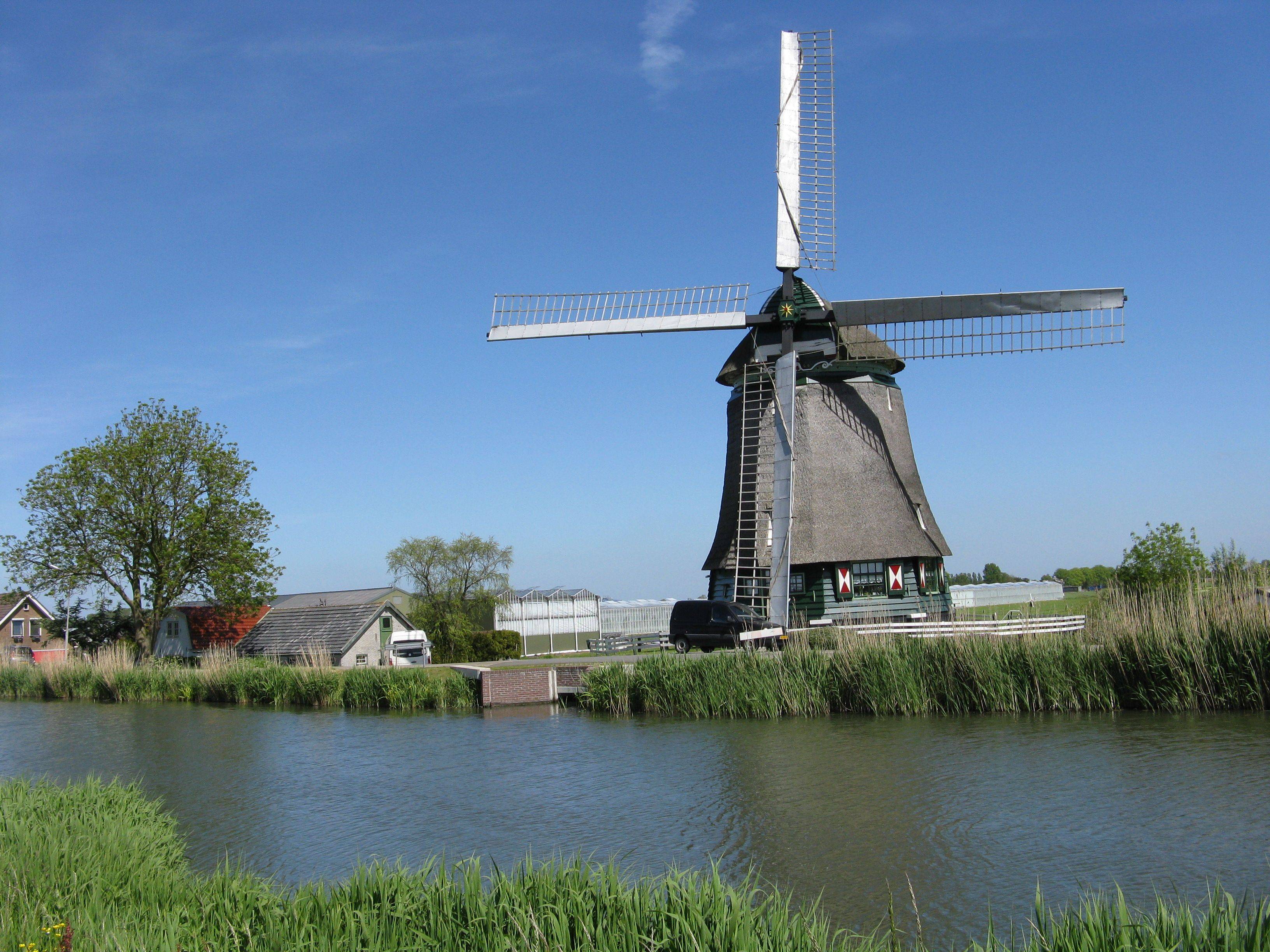 穿越荷兰乌特勒支:风车与运河交织的迷人城市