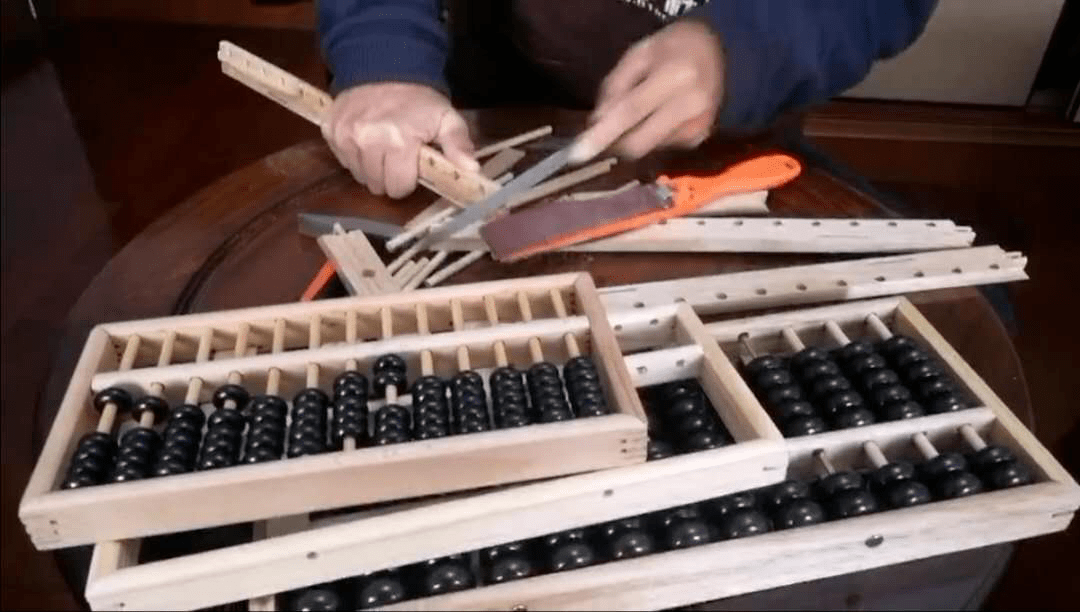 05档制作04定位03梁制作02打磨木框01制作工序算盘是财富地位的象征