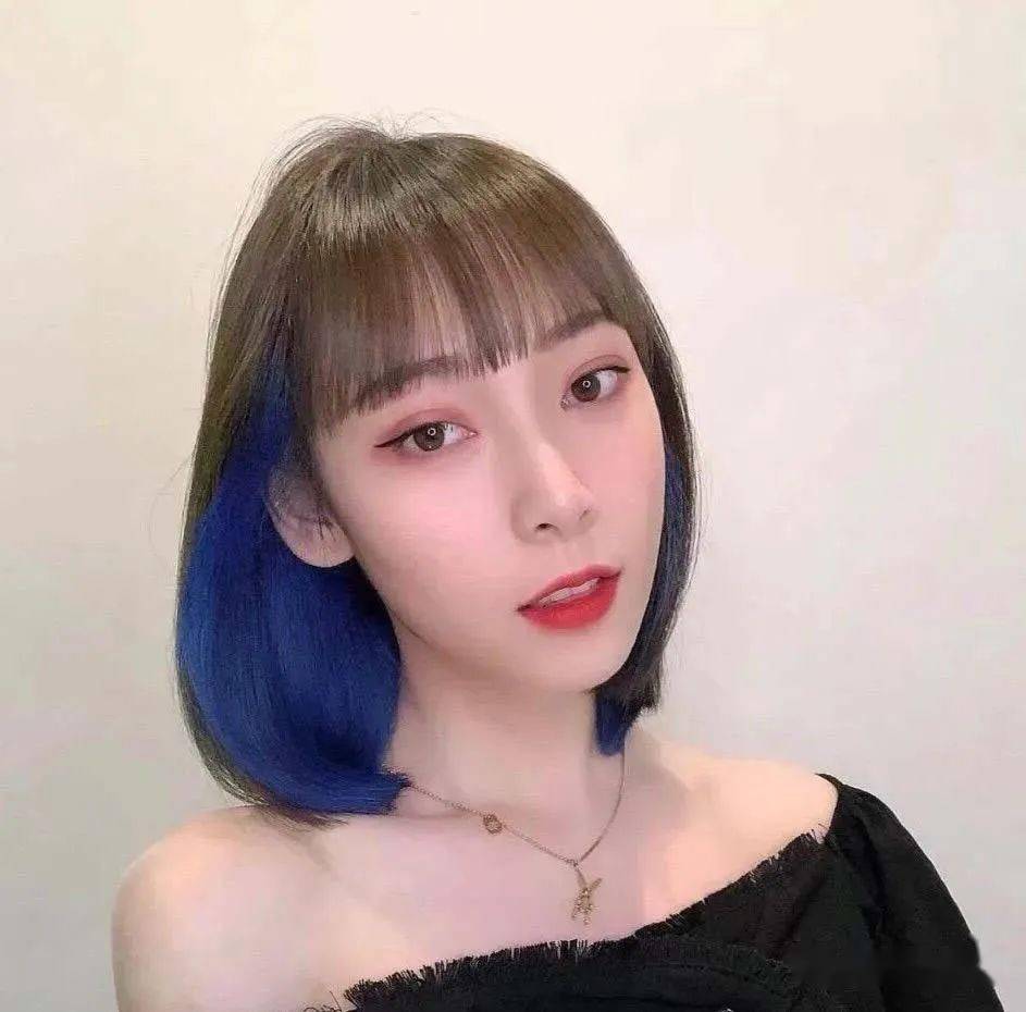 将这种低调而又潮流的染发方法加入短发设计中,看起来就像戴了一个