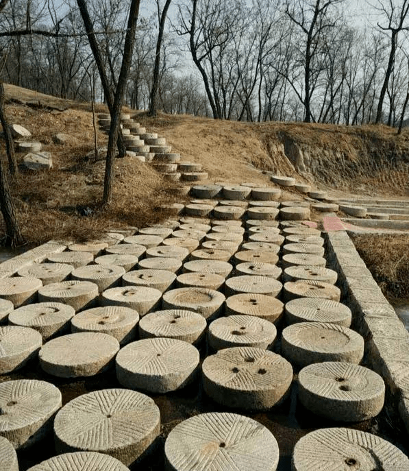 古旧石磨在园林景观中的应用有图有真相