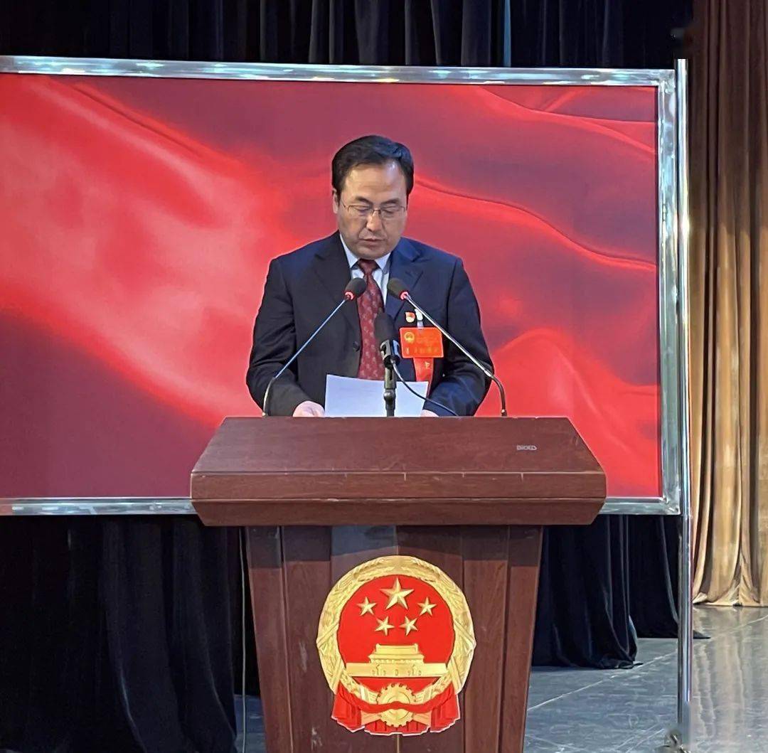 旗人民政府旗长 胡成东政府工作报告上午9时,杨进明宣布:太仆寺旗第