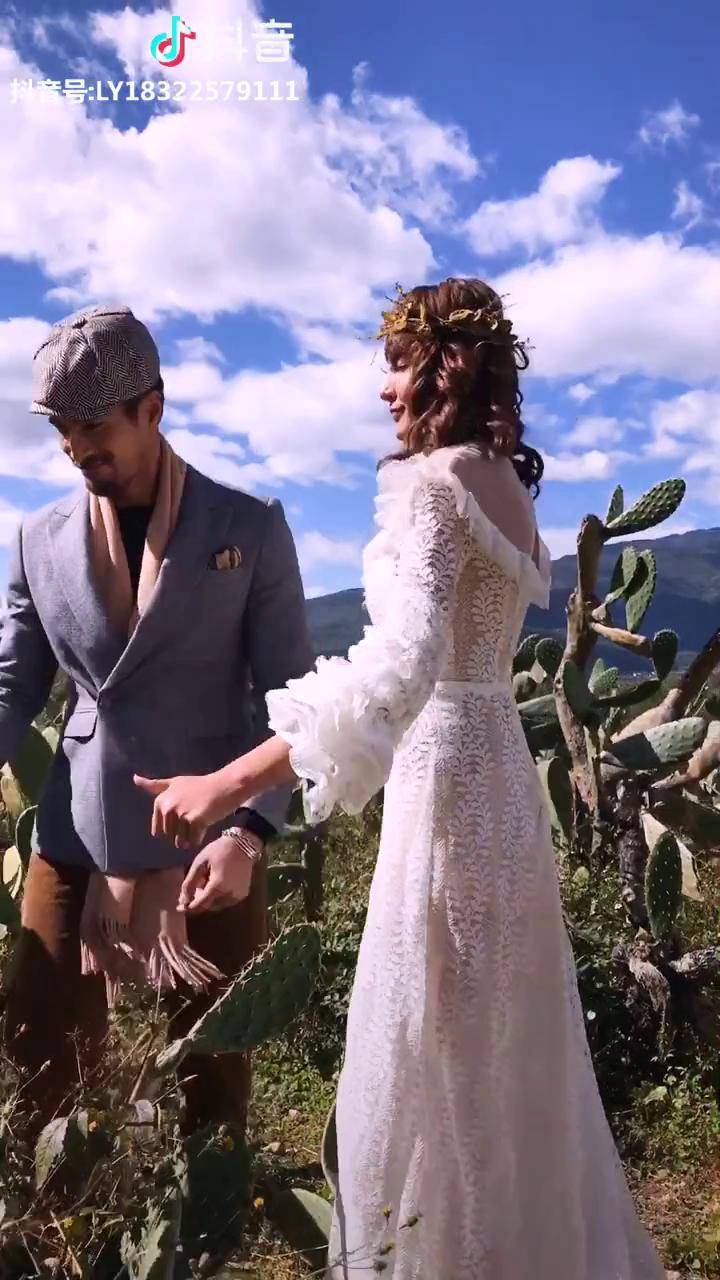 看大叔莎莎拍照是心跳的感觉美照的幕后真相聚焦全球旅拍