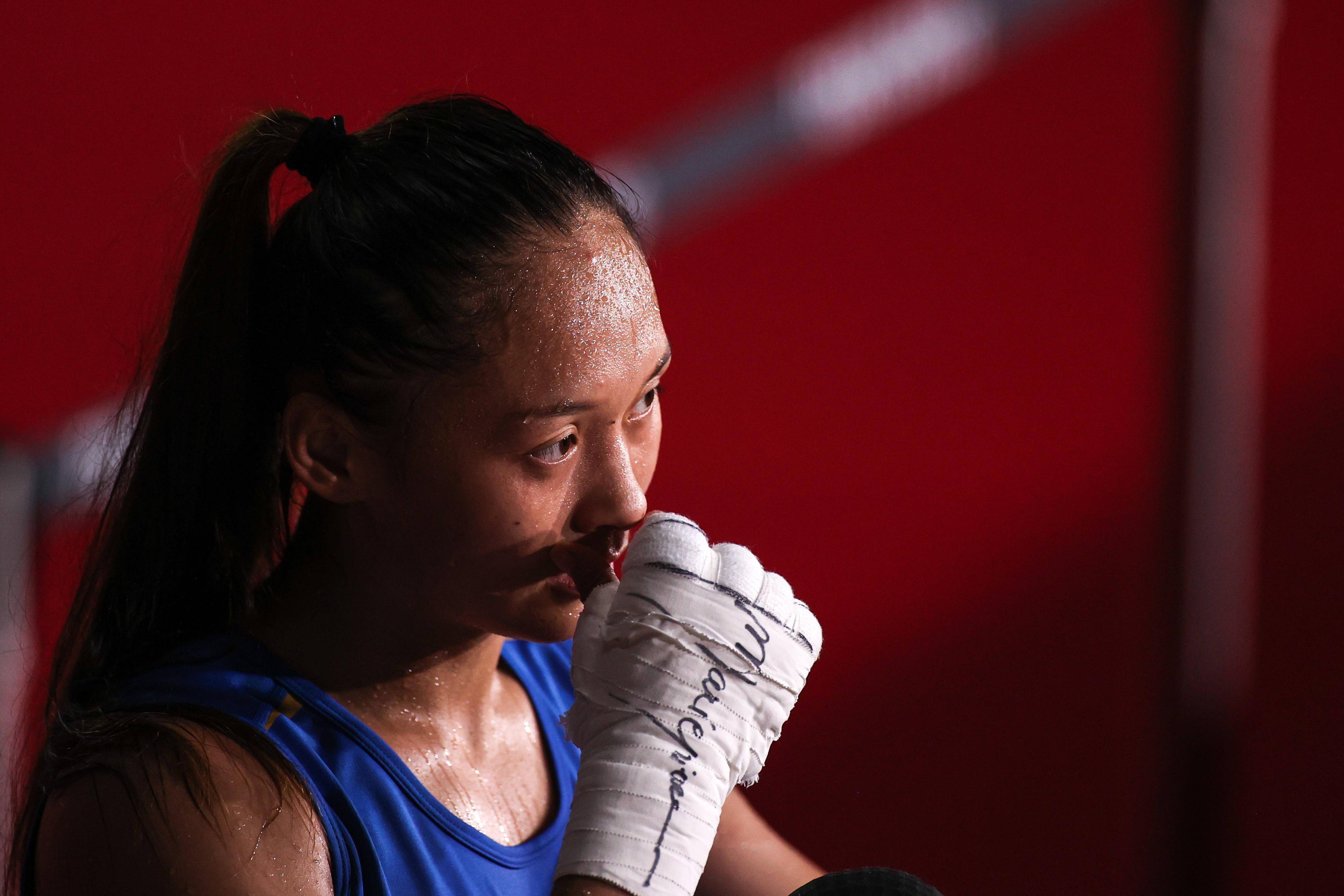 在东京奥运会拳击女子蝇量级(48-51公斤)四分之一决赛中,中国选手常园