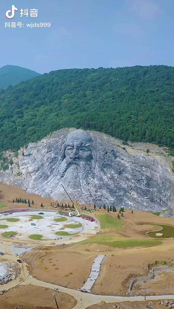 襄陽伏羲巨型磨崖像相傳伏羲人首蛇身三皇之一華夏先祖旅行小百科2020