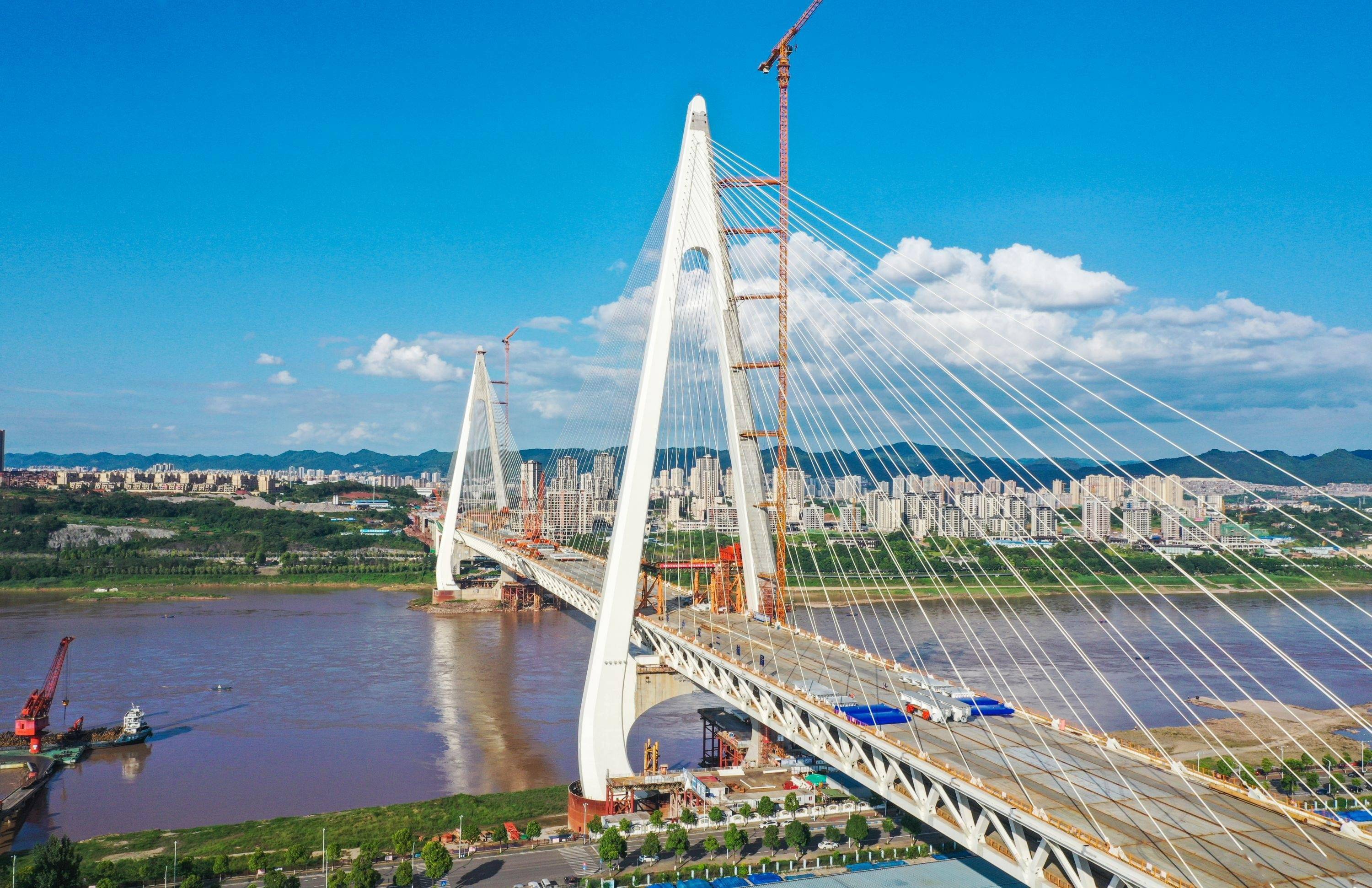 1毫米之内,"武汉造"世界最大跨度公轨两用钢桁梁斜拉桥精准合龙