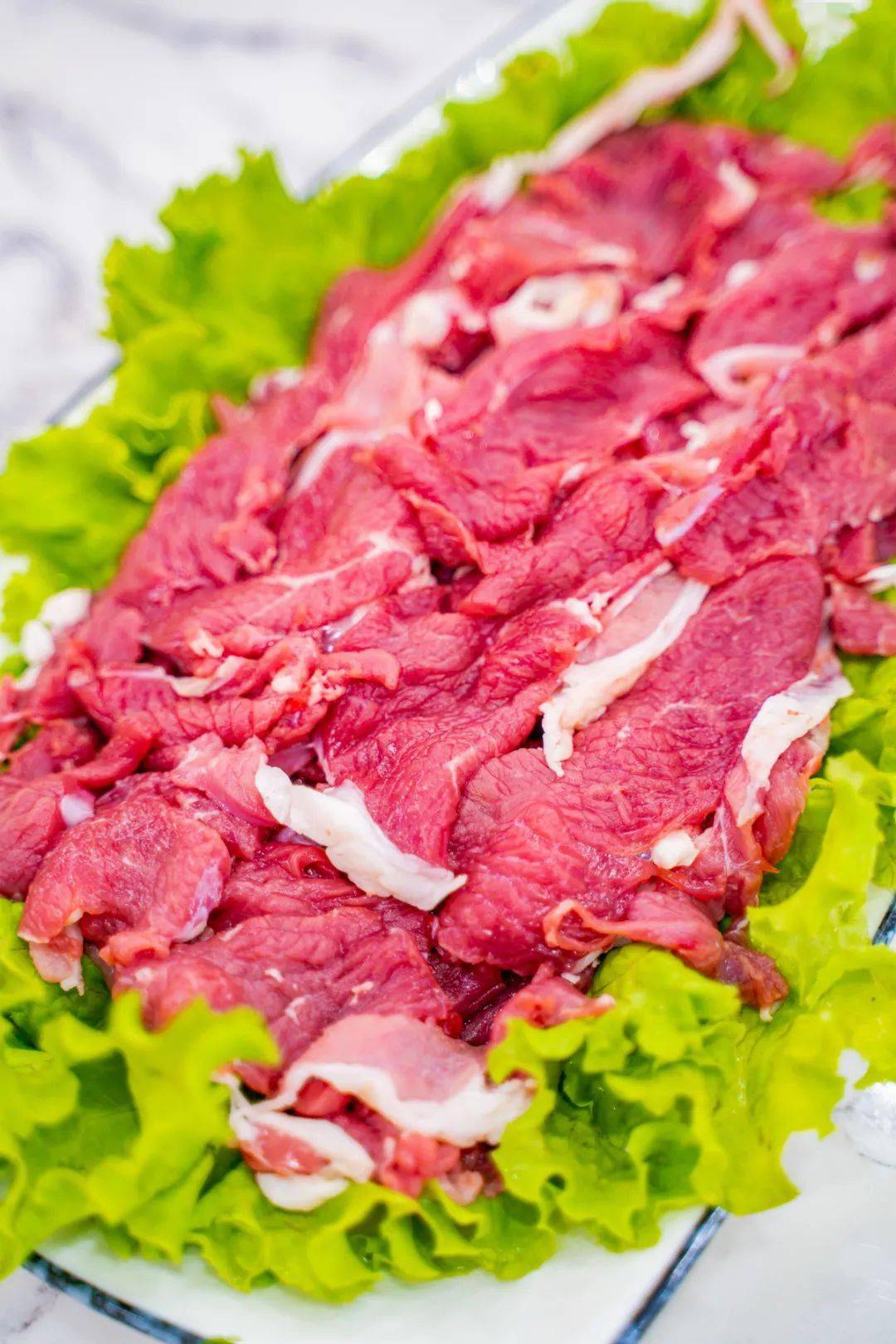 手切鲜羊肉■一筷羊肉夹入口中,先尝试吃吃无添加的羊肉的口感,肥而