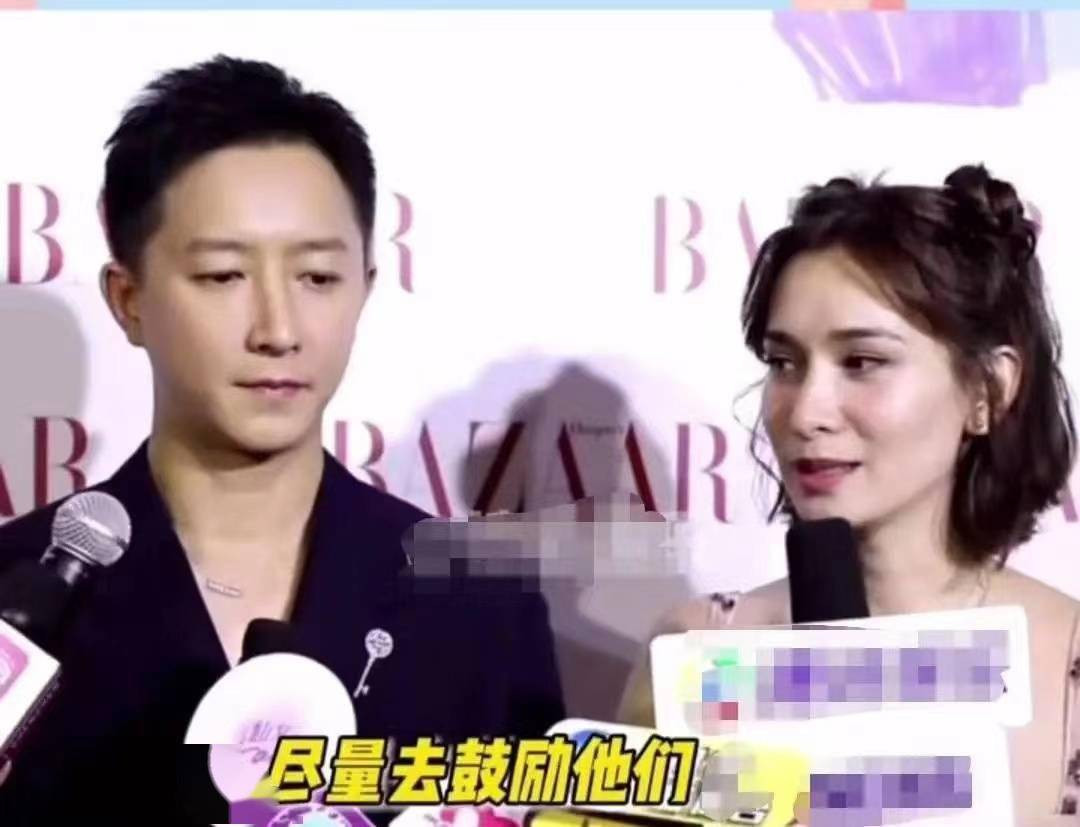 小腹韩庚夫妇牵手走红毯，甜蜜互动，卢靖珊小腹凸起，网友：孕相十足？