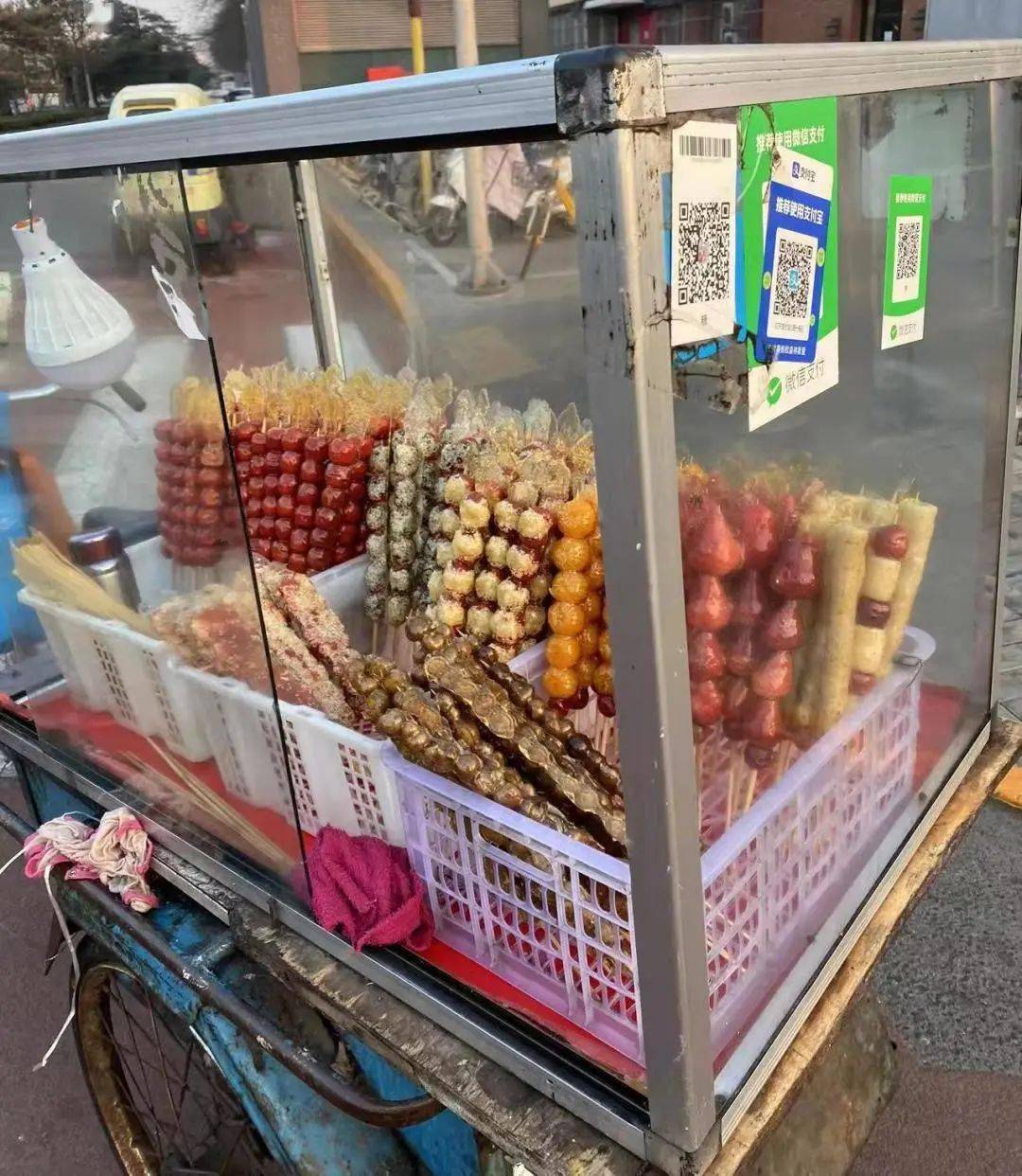 校园周边无照经营糖葫芦,路途售卖1串即被查_执法人员_当事人_三轮车