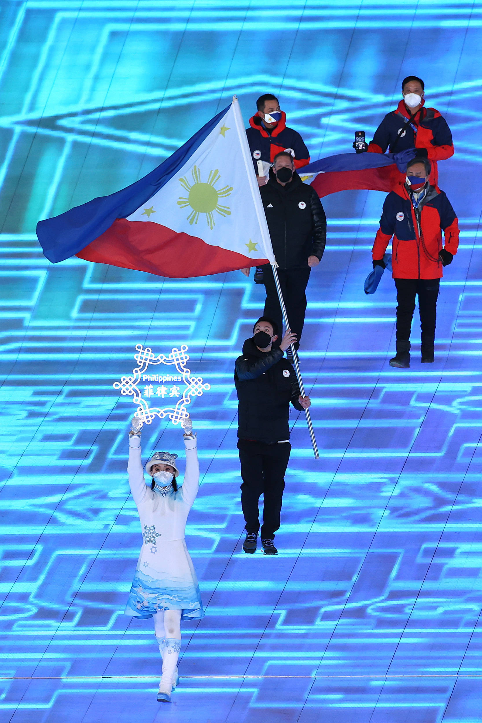 成绩|一人一国｜第二次踏上冬奥赛场，阿萨已是菲律宾冰雪旗帜
