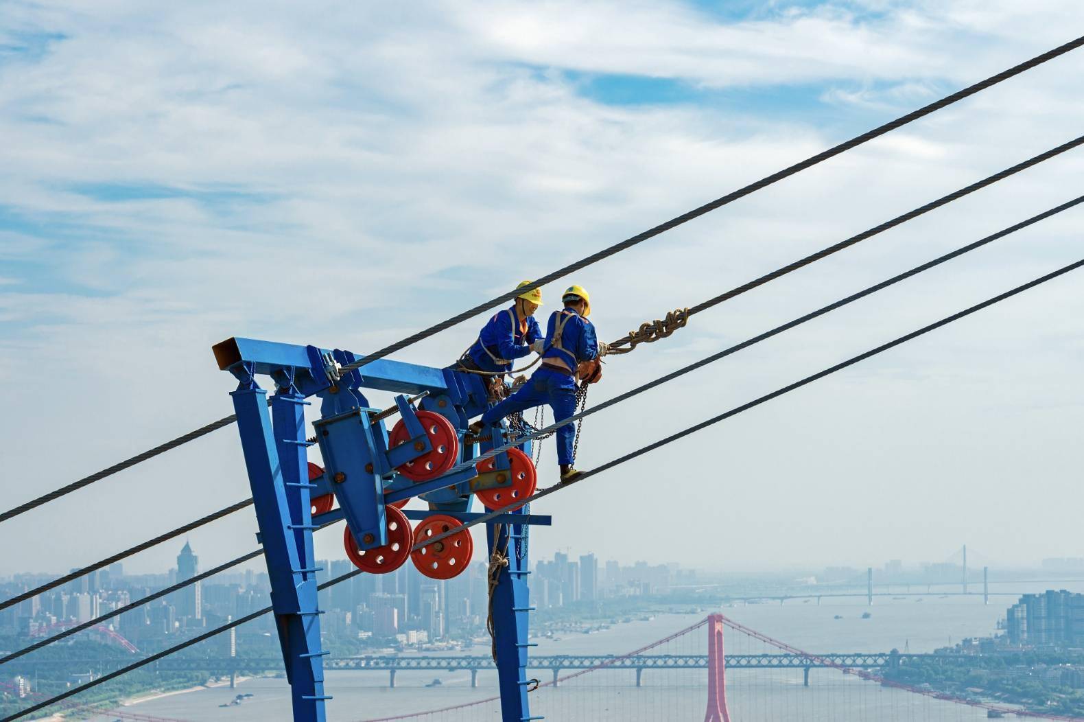 夫妻摄影师镜头下的桥梁建设者百米高空搭天梯