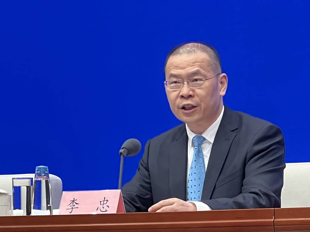 人社部副部长答封面新闻_李忠_基本_发展