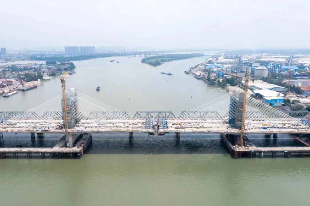 特大桥效果图开足马力预计10月1日前全线贯通马房特大桥工程横跨北江