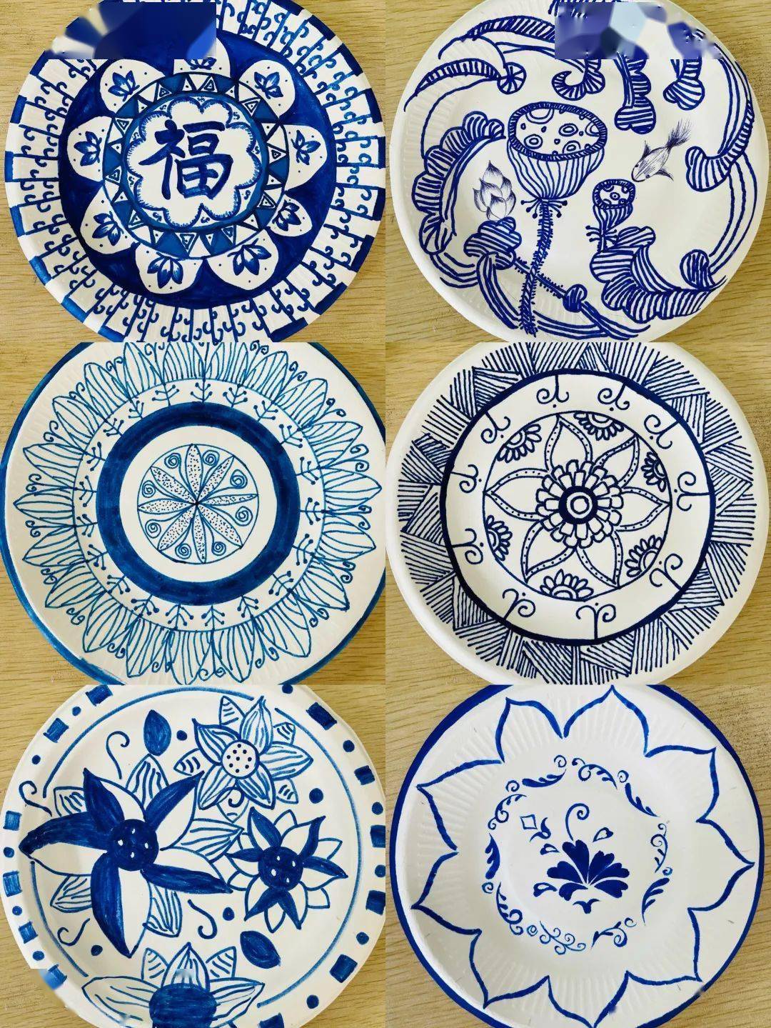 青花瓷盘子画花纹图片