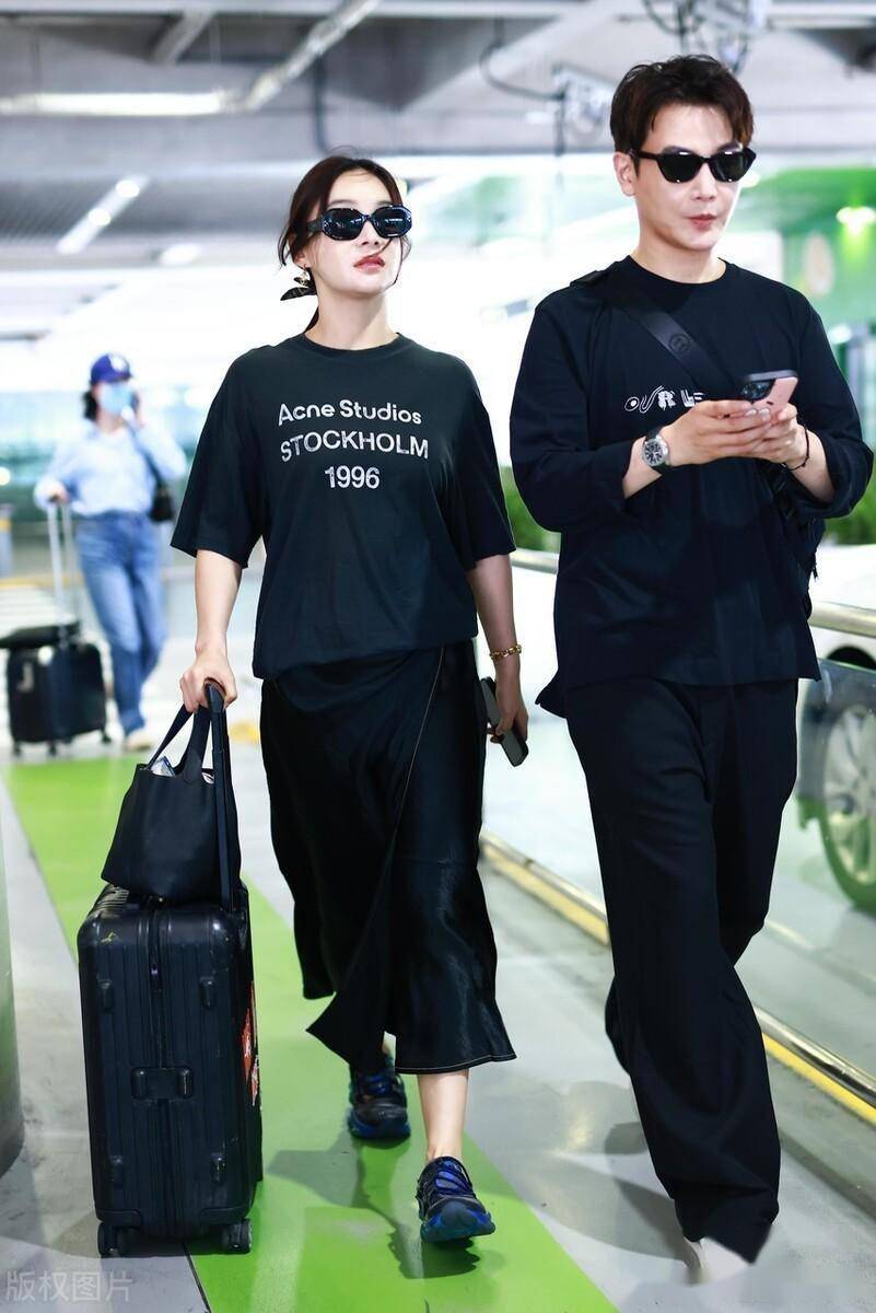 袁姗姗抵达上海机场,孙坚现身机场接机