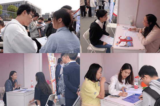 招聘会上人头攒动,毕业生求职氛围热情高涨,同学们根据自己的专业定位